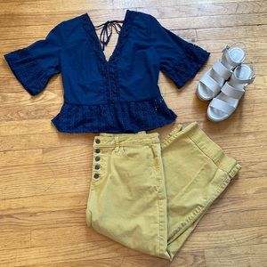 Navy peplum deep V top